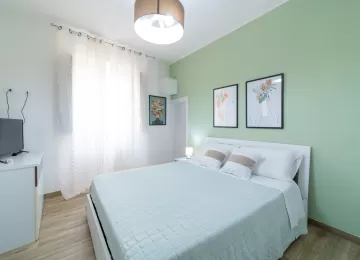 terra d'occidente - trilocale camera matrimoniale