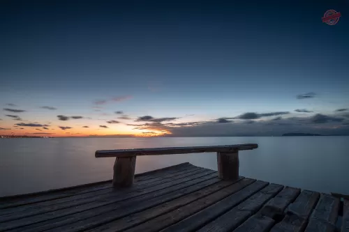 pontile tramonto allo stagnone