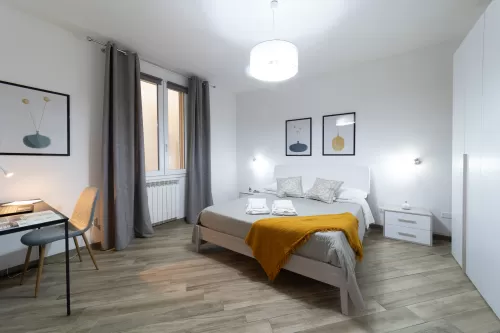 terra d'occidente - bilocale camera matrimoniale